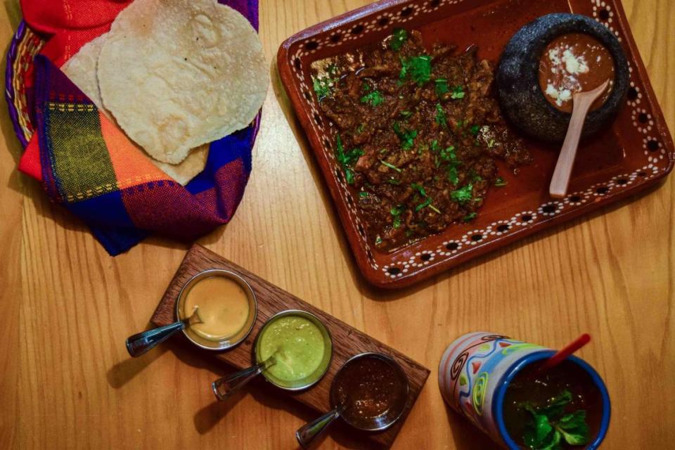 The carne con chile at Indita Mia in downtown Tacoma features wagyu beef in a smoky, spicy red sauce served with homemade tortillas and refried beans.