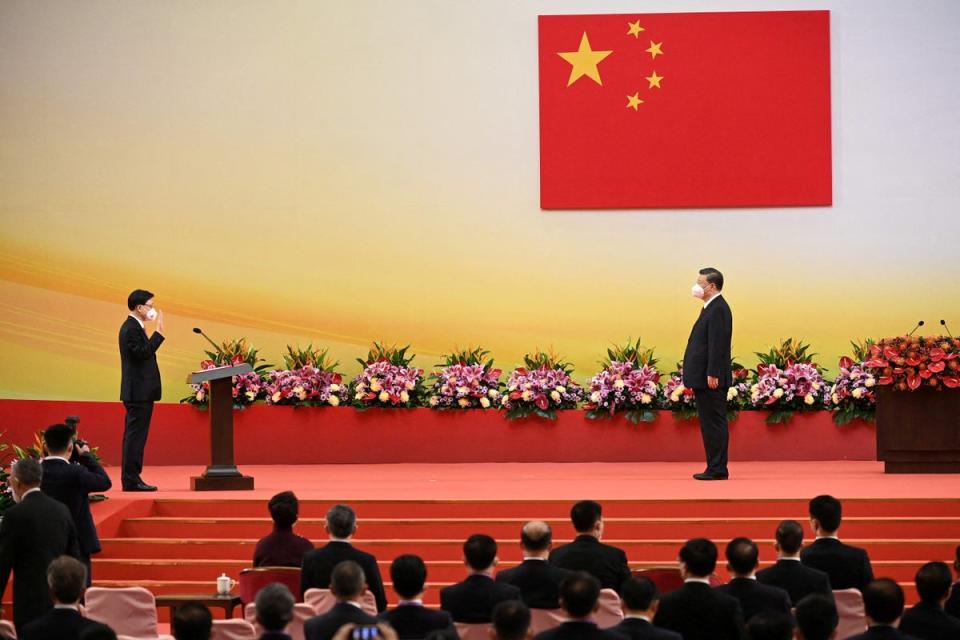 China's President Xi Jinping looks on as Hong Kong's incoming Chief Executive John Lee is sworn in (REUTERS)