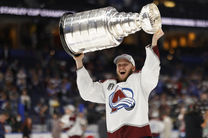 Colorado Avalanche's Logan O'Connor celebrates with the Stanley Cup after beating the Tampa Bay Lightning in the 2022 Stanley Cup Final. (Photo: Geoff Burke-USA TODAY Sports)