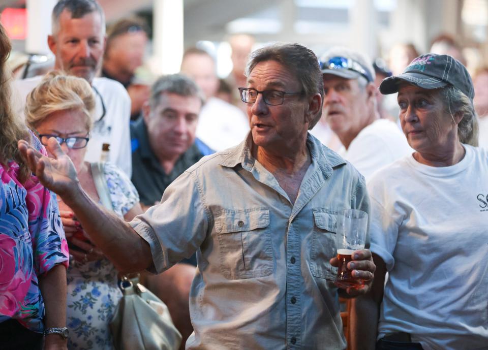 "How do we have any say on what goes on in our community," says John Snyder, during a meeting at Pirates Cove Resort and Marina on Thursday, Sept. 14, 2023, in Port Salerno. The front is led by the group Save Our Salerno.