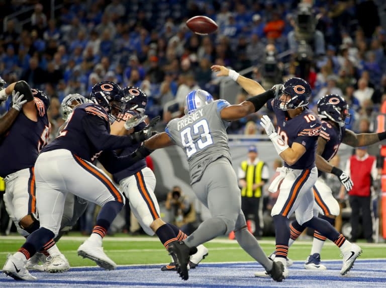 Chicago Bears quarterback Mitchell Trubisky passes out of the end zone against the Detroit Lions