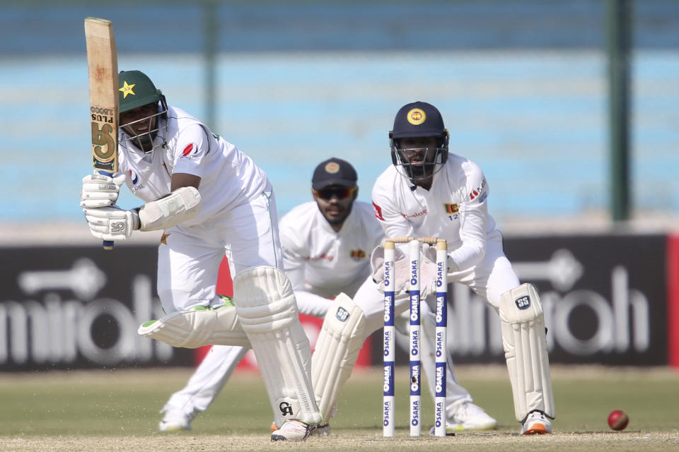 Pakistan's Abid Ali hits a boundary against Sri Lanka during the third day of their second Test cricket match at National Stadium in Karachi, Pakistan, Saturday, Dec. 21, 2019. (AP Photo/Fareed Khan)