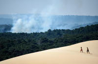 <p>Le 12 juillet, dans la forêt de La Teste-de-Buch, près de la Dune du Pilat, un incendie se déclenche, les arbres prennent feu les uns après les autres et le feu se propage. L'impensable est en train de se passer... (Photo by GAIZKA IROZ / AFP)</p> 