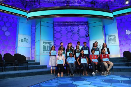 May 31, 2018; National Harbor, MD, USA; Competitors who made it through to the evening round of the finals have they photo taken during the 2018 Scripps National Spelling Bee at the Gaylord National Resort and Convention Center. Mandatory Credit: Jack Gruber-USA TODAY NETWORK