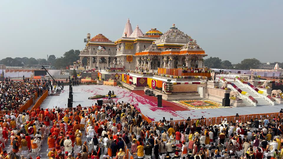 Crowds gather during the opening of a temple dedicated to Hindu deity Lord Ram, in Ayodhya, India, on January 22, 2024. - Rajesh Kumar Singh/AP