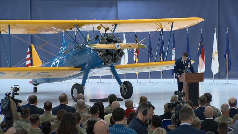 PHOTO: Tuskegee Airmen participate in PT-17 aircraft exchange ceremony. (ABC News)