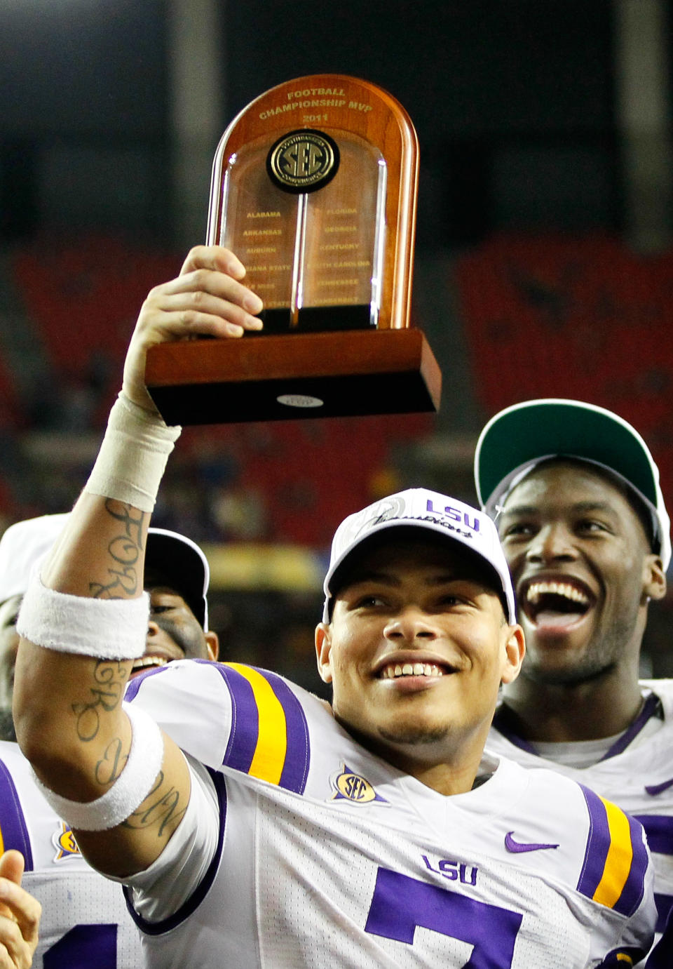 Tyrann Mathieu of the LSU Tigers celebrates after earning the MVP trophy in their 42-10 win over the Georgia Bulldogs during the 2011 SEC Championship Game at Georgia Dome on December 3, 2011 in Atlanta, Georgia. (Photo by Kevin C. Cox/Getty Images)
