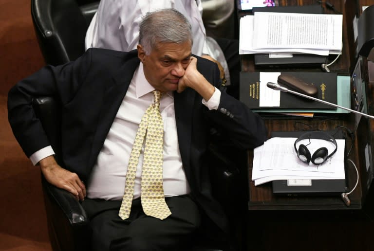 Sri Lanka's ousted prime minister Ranil Wickremesinghe was sworn in by President Maithripala Sirisena, who sacked him on October 26 and triggered a power struggle