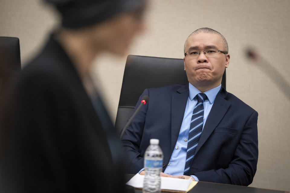 Tou Thao listens as prosecutor Erin Eldridge speaks during his sentencing hearing in Hennepin County District Court on Monday, Aug. 7, 2023, in Minneapolis, Minn. Thao, the last former Minneapolis police officer convicted in state court for his role in the killing of George Floyd, has been sentenced to 4 years and 9 months, even as he denied wrongdoing. (Leila Navidi/Star Tribune via AP)