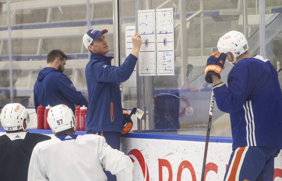 Edmonton Oilers head coach Kris Knoblauch directs his team during NHL hockey practice, Wednesday, June 5, 2024, in Edmonton, Alberta. The Oilers take on the Florida Panthers in Game 1 of the Stanley Cup Finals on Saturday in Sunrise, Fla. (Jason Franson/The Canadian Press via AP)
