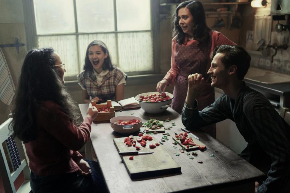 Ashley Brooke as Margot Frank, Billie Boullet as Anne Frank, Bel Powley as Miep Gies, and Rudi Goodman as Peter van Pels in A Small Light (National Geographic for Disney/Dusan Martincek)