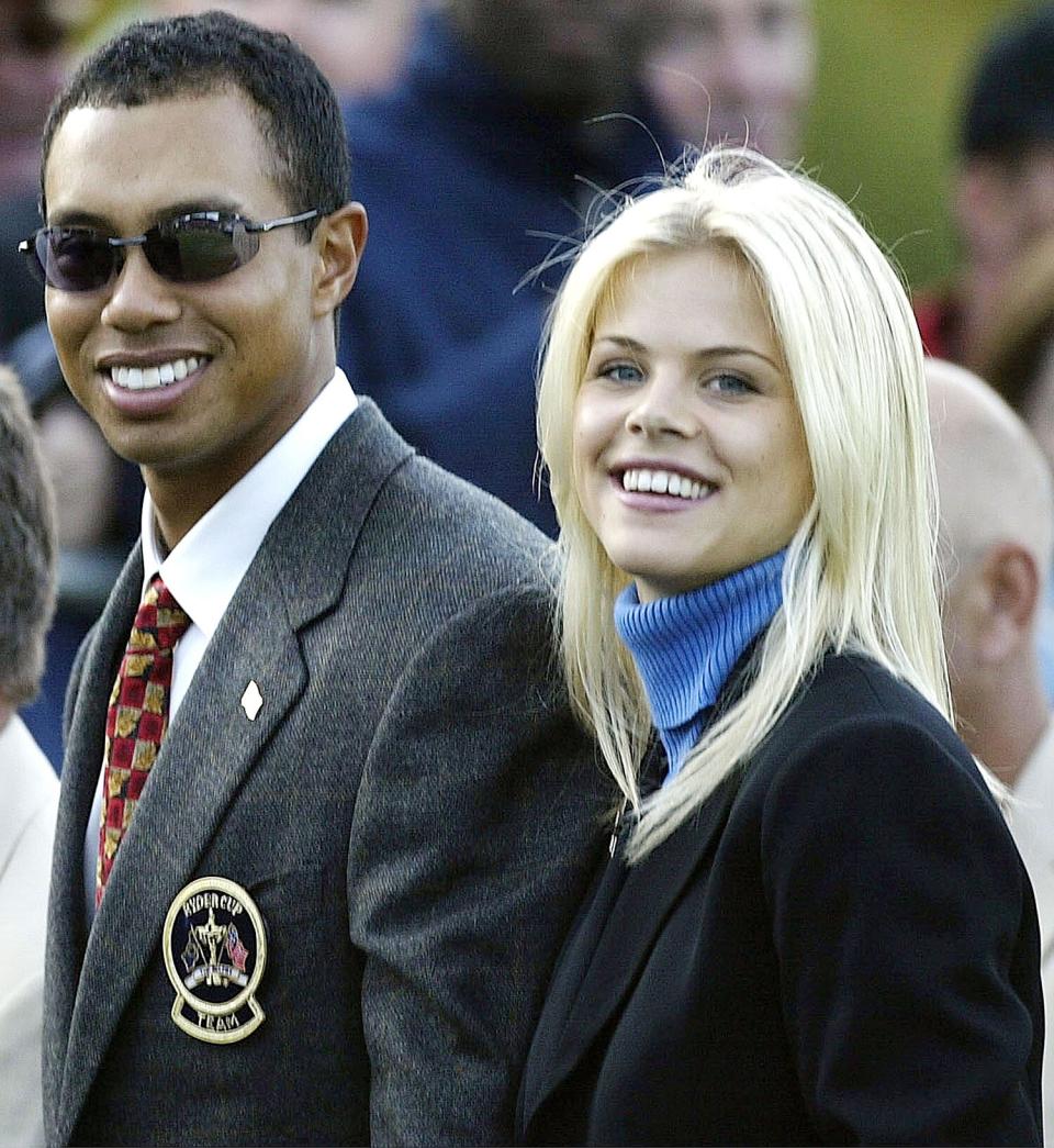 Tiger Woods poses with girlfriend Elin Nordegren during the opening ceremony for the 34th Ryder Cup