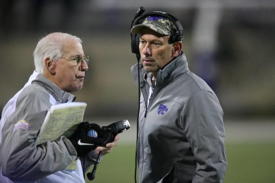 Kansas State Wildcats associate head coach Sean Snyder (R) talks to head coach Bill Snyder (L) against the Baylor Bears at Bill Snyder Family Football Stadium on Nov. 5, 2015.