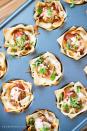 <p>These super simple apps pretty much taste like handheld lasagna.</p><p><em><a href="http://dearcrissy.com/mini-meatball-lasagna-cups-recipe/#_a5y_p=5789333" rel="nofollow noopener" target="_blank" data-ylk="slk:Get the recipe from Dear Crissy »;elm:context_link;itc:0;sec:content-canvas" class="link "><span class="redactor-invisible-space">Get the recipe from Dear Crissy »</span> </a></em></p>