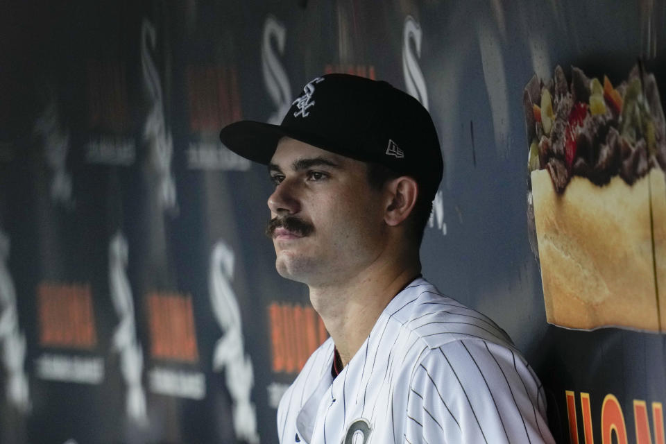 Chicago White Sox starting pitcher Dylan Cease sits in the dugout during the first inning of the team's baseball game against the Cleveland Guardians on Thursday, July 27, 2023, in Chicago. (AP Photo/Erin Hooley)