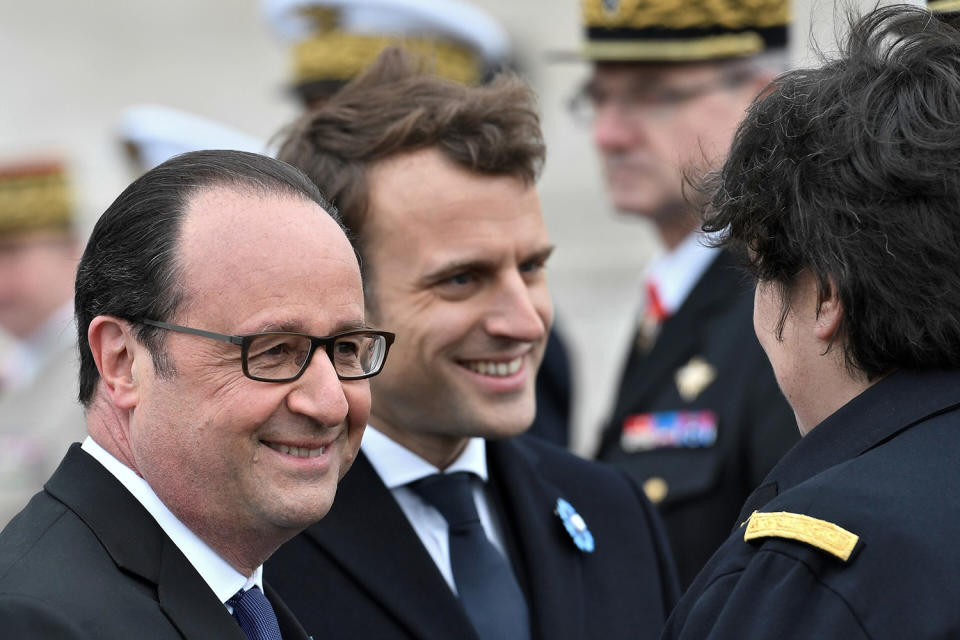 <p>Current French President Francois Hollande, left, and president-elect Emmanuel Macron attend a ceremony to mark the end of World War II at the Arc de Triomphe in Paris, Monday, May 8, 2017. (Stephane De Sakutin/Pool/Reuters) </p>