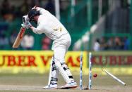 Cricket - India v New Zealand - First Test cricket match - Green Park Stadium, Kanpur - 26/09/2016. New Zealands's Mark Craig is bowled by India's Mohammed Shami. REUTERS/Danish Siddiqui