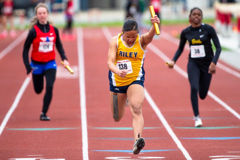 Riley’s Karis Johnson competes in the 4x100-meter relay event of the Goshen Relays Saturday, April 20, 2024 at Goshen High School.