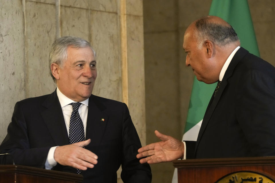 Egyptian Foreign Minister Sameh Shoukry, right, shakes hands with his Italian counterpart, Antonio Tajani after a press conference at the foreign ministry headquarters in Cairo, Egypt, Sunday, Jan. 22, 2023. (AP Photo/Amr Nabil)