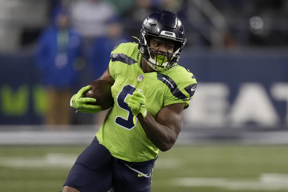 Seattle Seahawks running back Kenneth Walker III (9) runs against the San Francisco 49ers during the second half of an NFL football game in Seattle, Thursday, Dec. 15, 2022. (AP Photo/Stephen Brashear)
