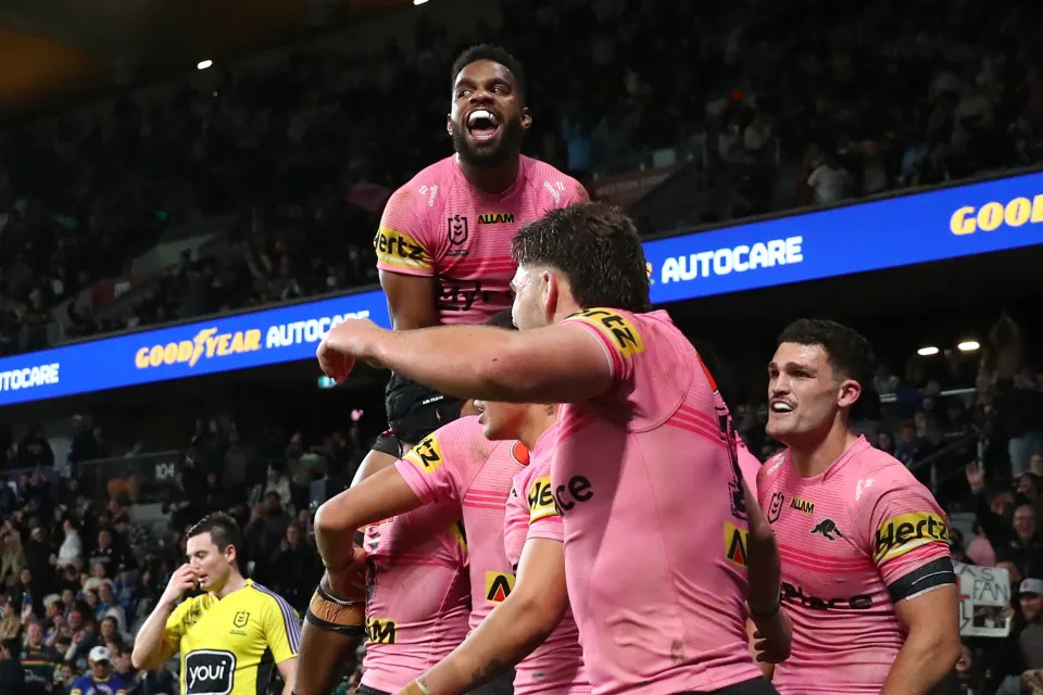 Brian To’o and the Panthers celebrate a try.