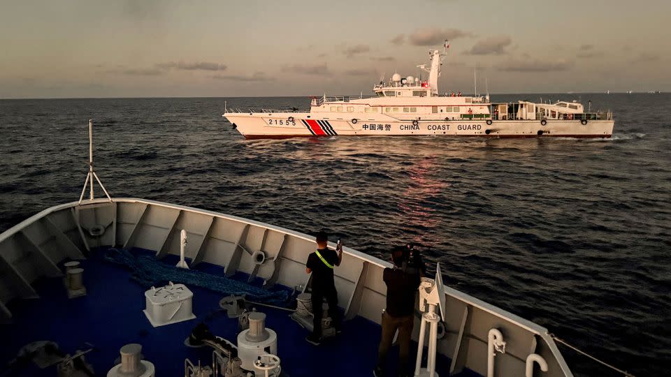 A Chinese Coast Guard vessel blocks a Philippine Coast Guard ship on its way to a resupply mission at Second Thomas Shoal in the South China Sea on March 5, 2024. - Adrian Portugal/Reuters
