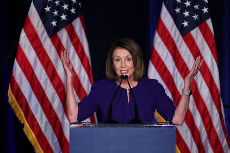 FILE PHOTO: U.S. House Minority Leader Nancy Pelosi reacts to the results of the U.S. midterm elections at a Democratic election night rally and party in Washington, U.S. Nov. 6, 2018. REUTERS/Jonathan Ernst/File Photo