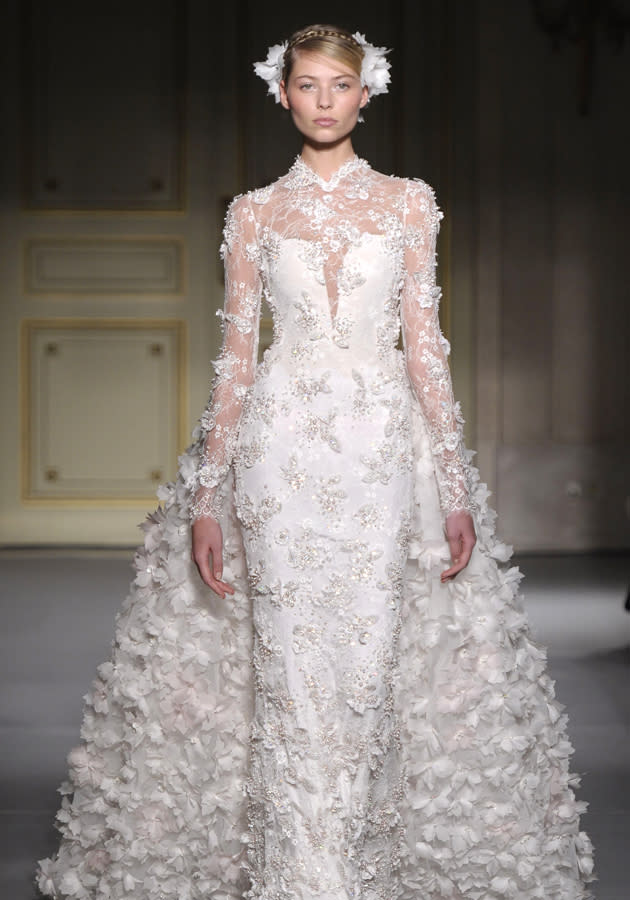 <b>Georges Hobieka SS13</b> <br><br>Romantic, flower-embellished dresses made for a dream-like show.<br><br>© Rex