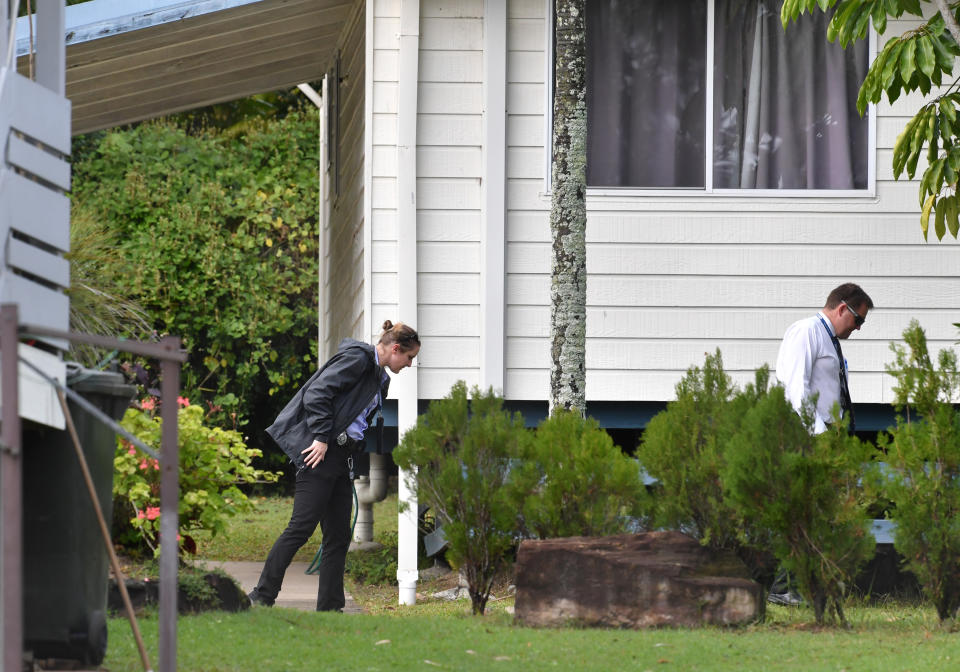 Police are seen searching the grounds of the mobile home park at Stapylton, south of Brisbane. Source: AAP