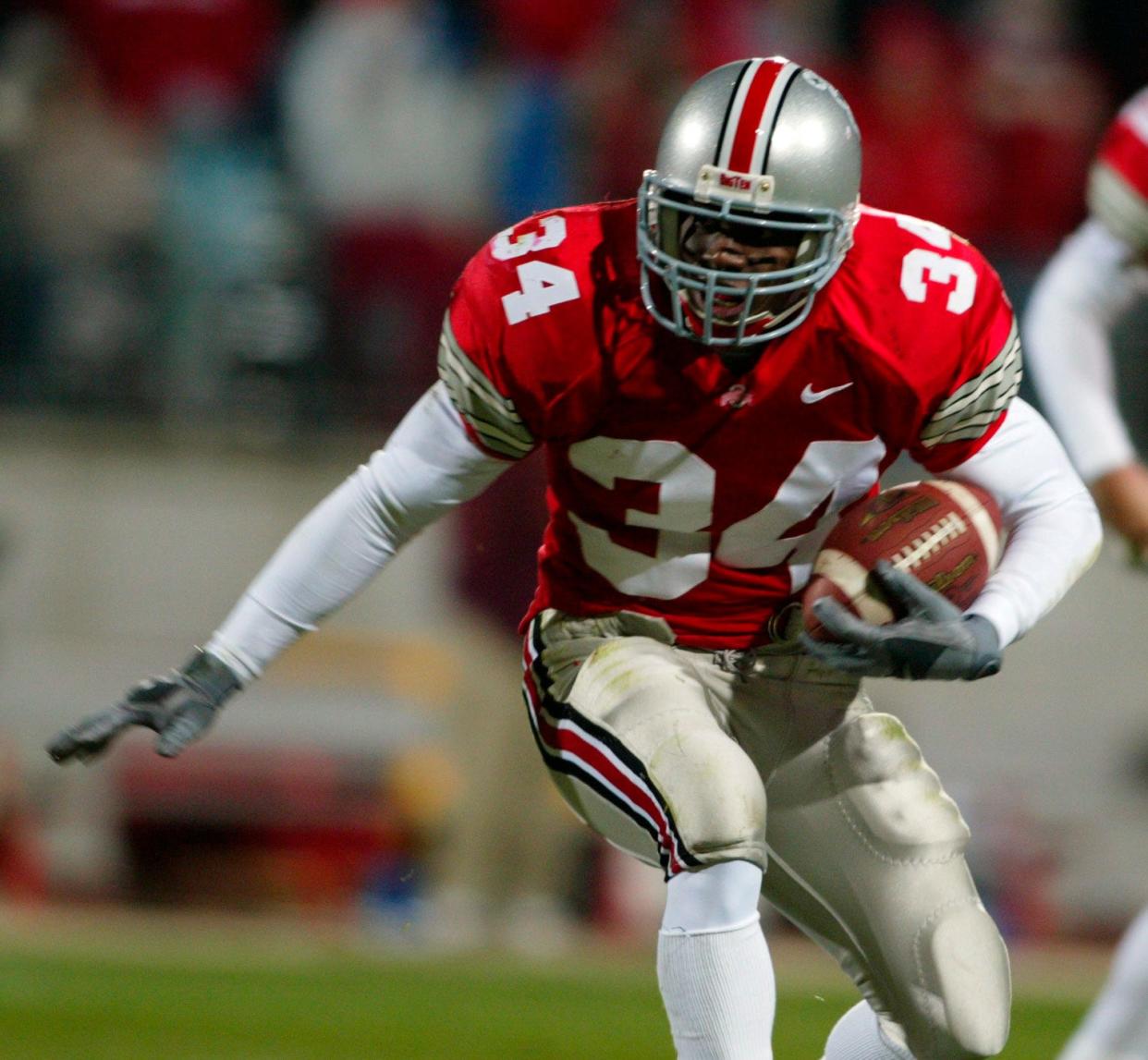 Ohio State running back JaJa Riley carries the ball against Minnesota on Nov. 2, 2002.