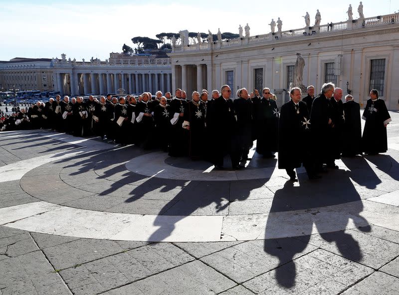 FILE PHOTO: Members of the Order of the Knights of Malta arrive in St. Peter Basilica for their 900th anniversary in Vatican