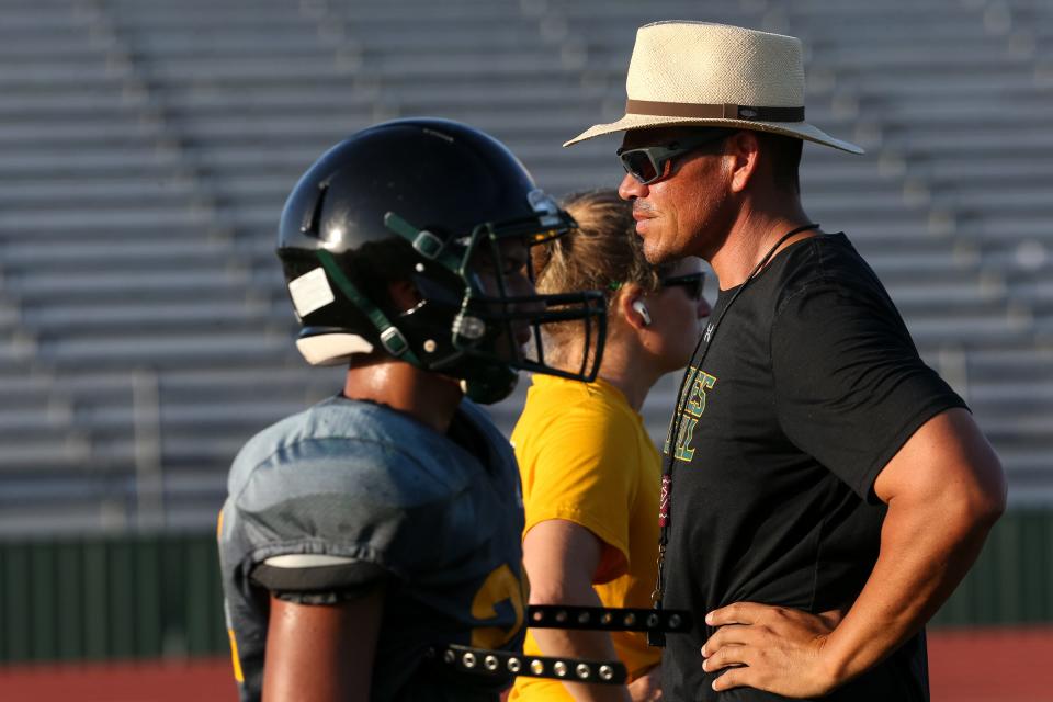 Rockport-Fulton head football coach football Jacob Bible watches practice on Aug. 14, 2023, at Pirate Stadium in Texas.