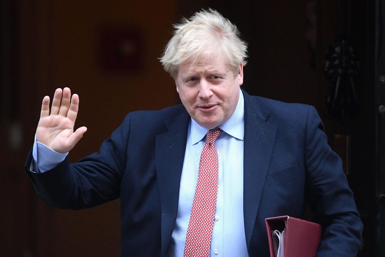 Prime Minister Boris Johnson leaves 10 Downing Street for PMQ's on March 25, 2020 in London, England.