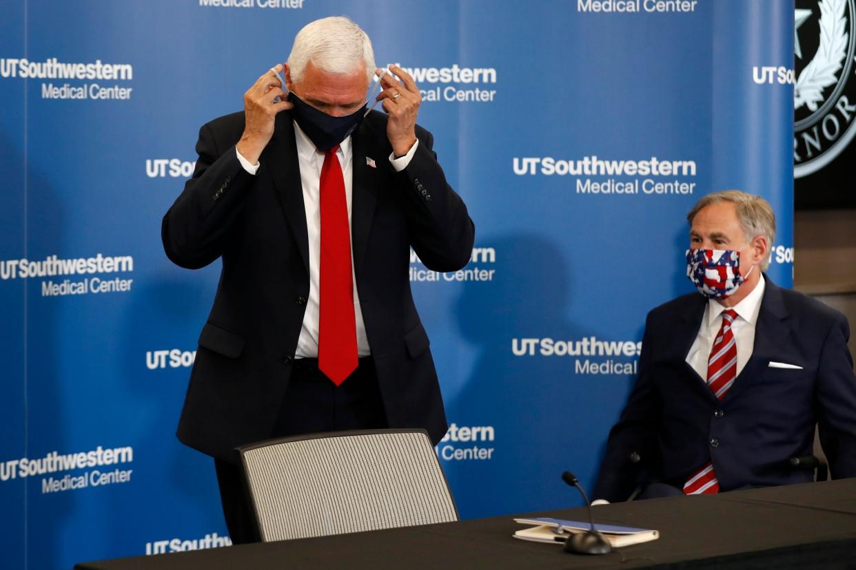 Vice president Mike Pence and Texas governor Greg Abbott mask up for a briefing on the state's coronavirus crisis: AP