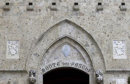 The entrance of the Monte dei Paschi bank headquarters is seen in Siena, central Italy, January 29, 2016. Merger talks between Italian cooperative lenders Banco Popolare and Banca Popolare di Milano (BPM) took a big step forward on Thursday when Rome backed a tie-up. REUTERS/Max Rossi