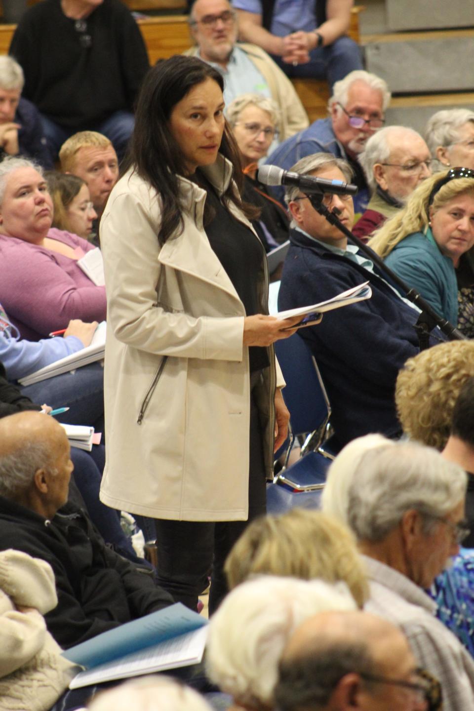 Nicole Bartlett, chair of Mashpee School Committee, explained how capital improvement funds would help Mashpee Public Schools. Article 11 passed with a two-thirds vote.