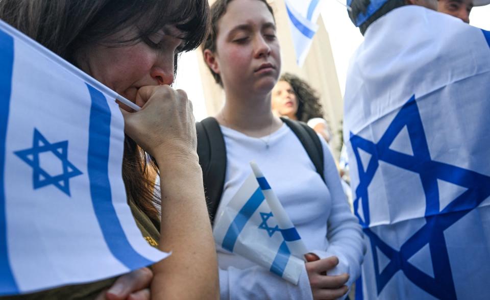 Demonstrators gather during a rally in support of Israel outside the West Los Angeles Federal Building on Oct. 10, 2023. <a href="https://www.gettyimages.com/detail/news-photo/demonstrators-gather-during-a-rally-in-support-of-israel-news-photo/1717387782?adppopup=true" rel="nofollow noopener" target="_blank" data-ylk="slk:Robyn Beck/AFP via Getty Images;elm:context_link;itc:0;sec:content-canvas" class="link ">Robyn Beck/AFP via Getty Images</a>