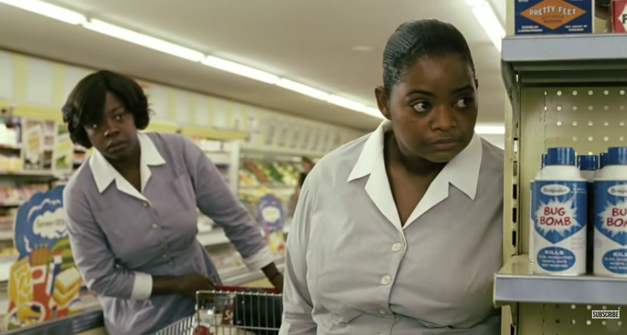 Two Black maids shop in a '60s grocery store