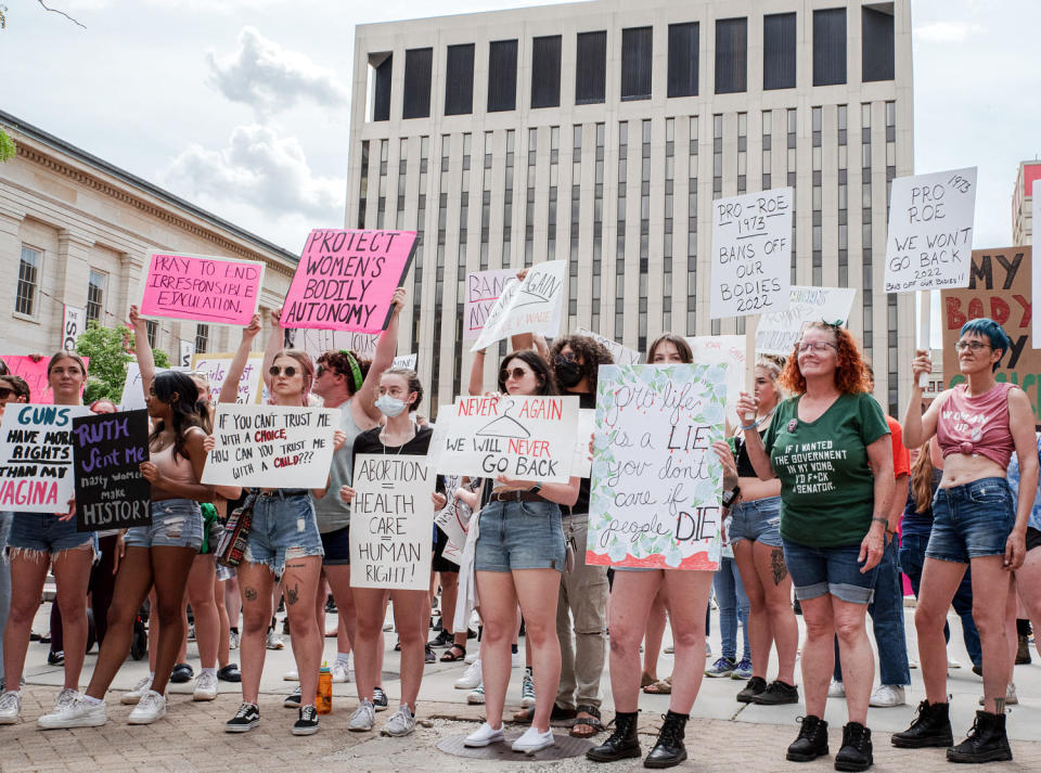 Protesters hold signs at a pro abortion rights rally, in Dayton, Ohio (Whitney Saleski / LightRocket via Getty Images files )