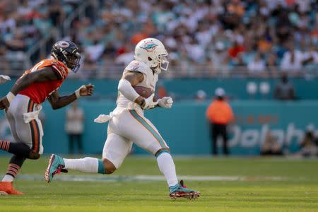 FILE PHOTO: Oct 14, 2018; Miami Gardens, FL, USA; Miami Dolphins wide receiver Albert Wilson (15) runs the ball in for a touchdown during the fourth quarter against the Chicago Bears at Hard Rock Stadium. Mandatory Credit: Douglas DeFelice-USA TODAY Sports