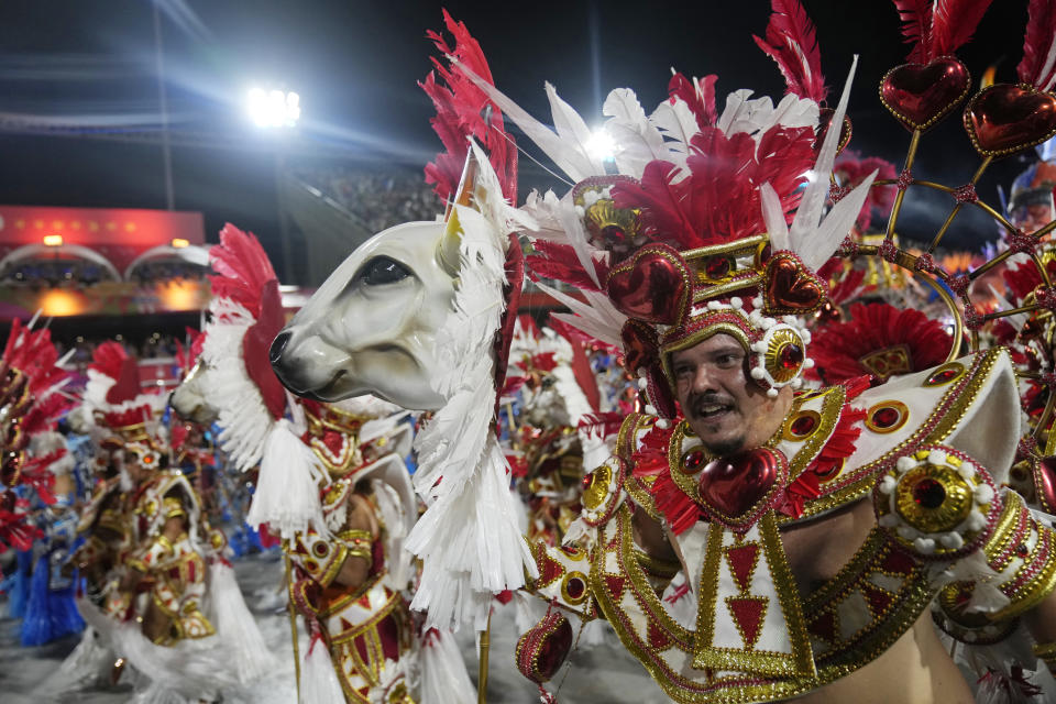 Performers from the Vila Isabel samba school parade during Carnival celebrations at the Sambadrome in Rio de Janeiro, Brazil, Tuesday, Feb. 21, 2023. (AP Photo/Silvia Izquierdo)