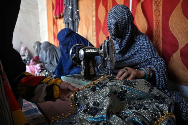 PHOTO: Afghan women work in a garments factory in Kandahar, on July 30, 2022. (Lillian Suwanrumpha/AFP via Getty Images)