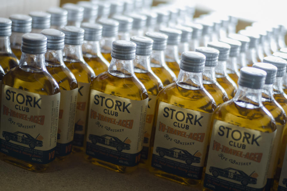 In this Thursday, Feb. 28, 2019 photo, bottles of a special edition of Stork Club rye whiskey stand in a storage room of the German whiskey maker Spreewood Distillerie in Schlepzig, Germany. (AP Photo/Markus Schreiber)