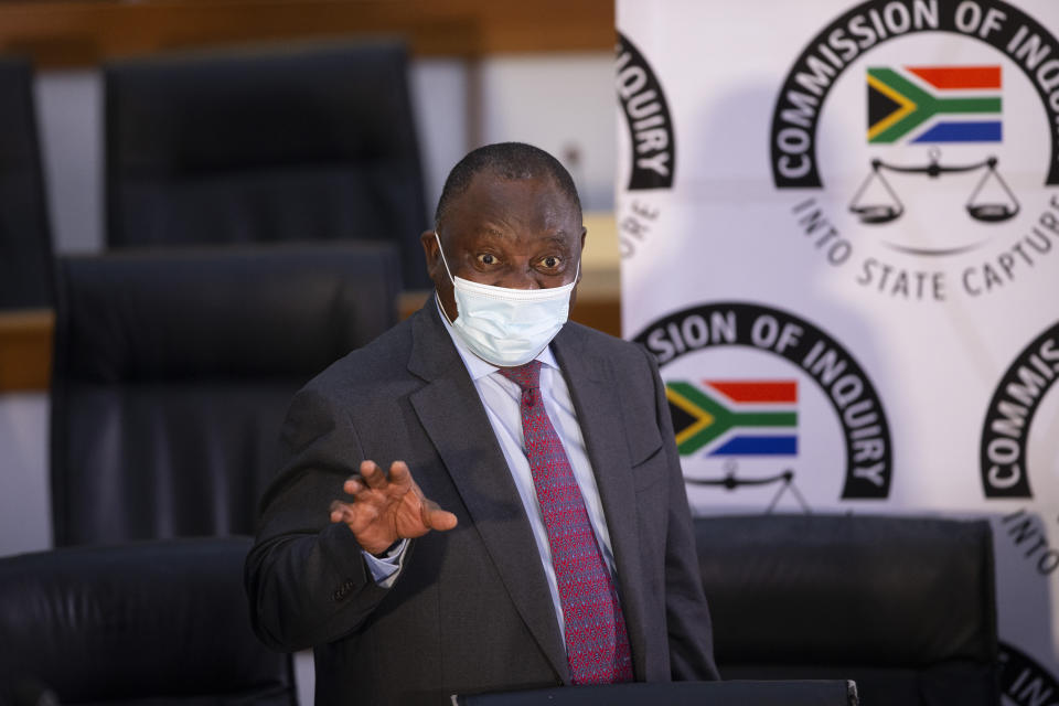 South African President Cyril Ramaphosa appears on behalf of the ruling African National Congress party at the Zondo Commission of Inquiry into state corruption in Johannesburg, South Africa, Thursday, April 29, 2021. Ramaphosa says rampant corruption has seriously damaged South Africa’s economy and people’s trust in the government. (Kim Ludbrook/Pool via AP)