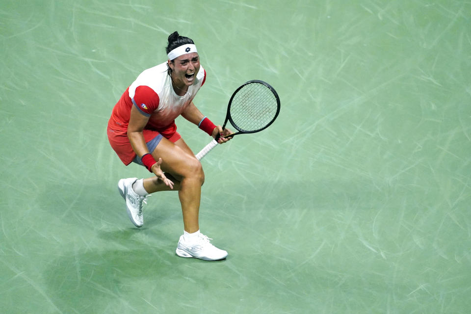 Ons Jabeur, of Tunisia, reacts after defeating Caroline Garcia, of France, in the semifinals of the U.S. Open tennis championships on Thursday, Sept. 8, 2022, in New York. (AP Photo/Julia Nikhinson)