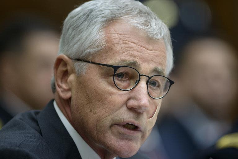 US Secretary of Defense Chuck Hagel speaks during a hearing of the House Armed Services Committee on Capitol Hill in Washington, DC, on November 13, 2014