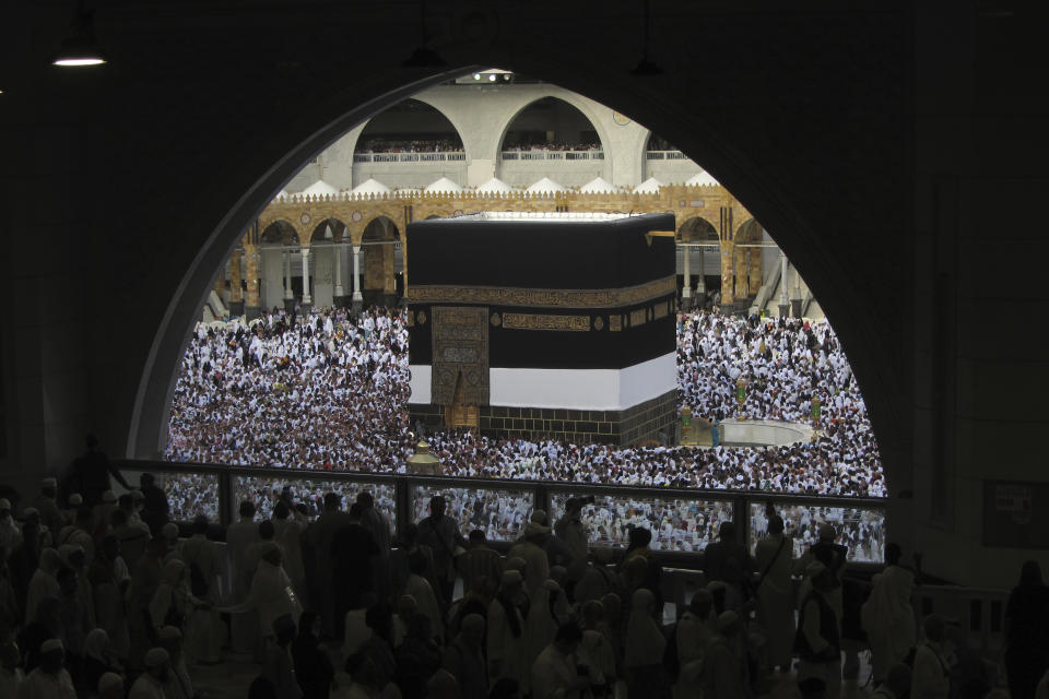 Muslim pilgrims circumambulate around the Kaaba, the cubic building at the Grand Mosque, during the annual hajj pilgrimage in Mecca, Saudi Arabia, Monday, June 26, 2023, before heading to Mina in preparation for the Hajj, the fifth pillar of Islam and one of the largest religious gatherings in the world. (AP Photo/Amr Nabil)