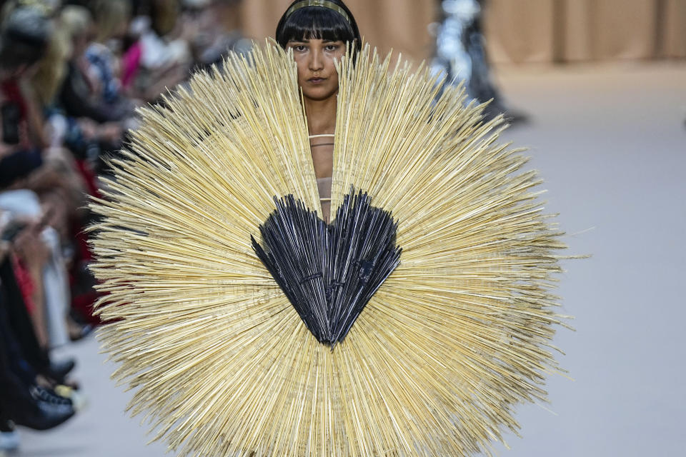 A model wears a creation as part of Jean Paul Gaultier's Haute Couture Fall/Winter 2022-2023 fashion collection presented Wednesday, July 6, 2022 in Paris. (AP Photo/Michel Euler)