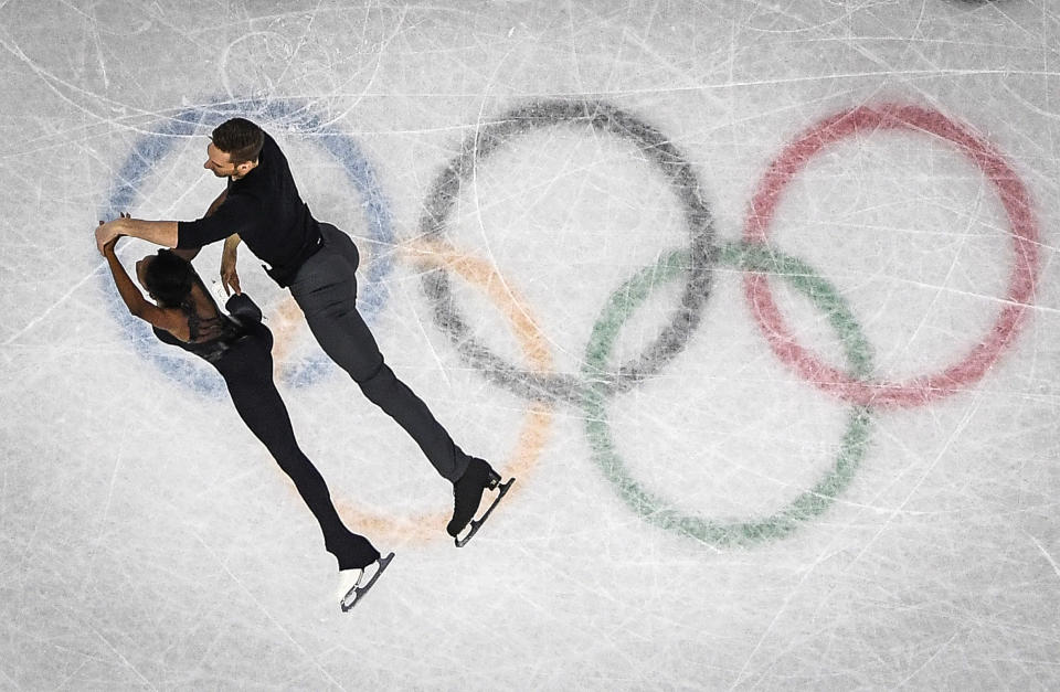 <p>France’s Vanessa James and France’s Morgan Cipres compete in the pair skating free skating of the figure skating event during the Pyeongchang 2018 Winter Olympic Games at the Gangneung Ice Arena in Gangneung on February 15, 2018. / AFP PHOTO / ARIS MESSINIS </p>