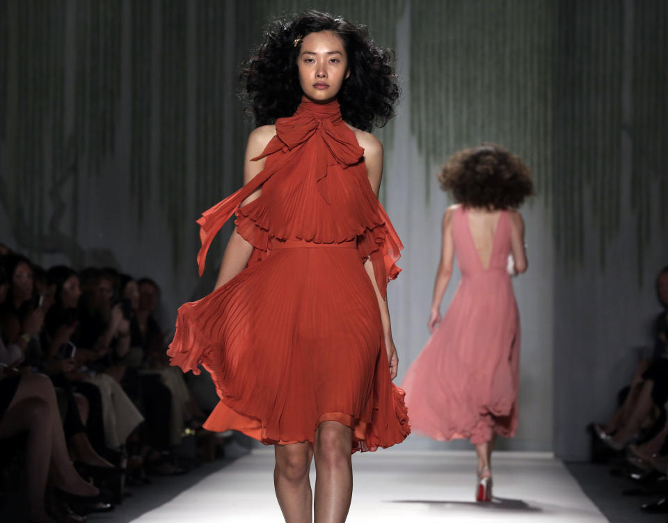 The Jenny Packham Spring 2014 collection is modeled during Fashion Week in New York, Tuesday, Sept. 10, 2013. (AP Photo/Richard Drew)